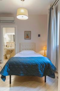 A bed or beds in a room at Affittacamere Zanobi 45