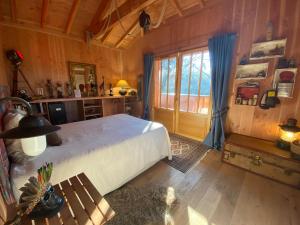 Postel nebo postele na pokoji v ubytování Chambre d'hôtes sous la canopée