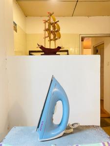 a blue object sitting on top of a counter at Gee Hills in Weligama