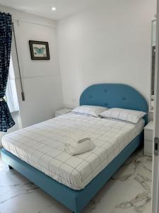 Postel nebo postele na pokoji v ubytování Iris Affitacamera