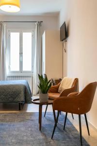 A television and/or entertainment centre at Affittacamere Zanobi 45
