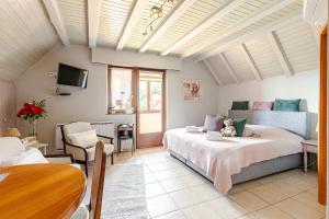 Postel nebo postele na pokoji v ubytování Chambre du Vigneron - Domaine Léon BLEESZ + 24 fotografií