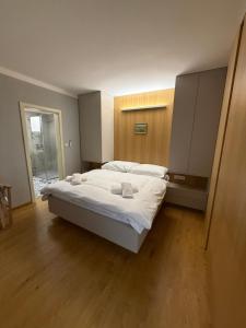 Posteľ alebo postele v izbe v ubytovaní Apartments Cafe Hexe