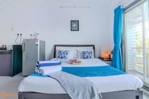 Nilaya Nest Away客房内的一张或多张床位