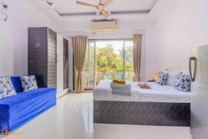 Nilaya Nest Away客房内的一张或多张床位
