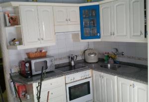 Kuchyň nebo kuchyňský kout v ubytování Los Cristianos Beach property
