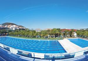 Πισίνα στο ή κοντά στο New beach apartment
