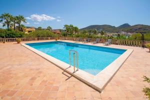 The swimming pool at or close to Villa Vistas Puerto by Mallorca Infinity