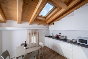 Kuchyň nebo kuchyňský kout v ubytování Borgo Paolin - Camere in vigna + 37 fotografií