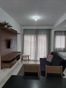 Et tv og/eller underholdning på Flat em Itaguaí