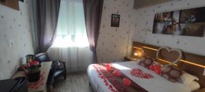 Tempat tidur dalam kamar di Hotel Belle Vue