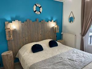 Postel nebo postele na pokoji v ubytování Gîte de Bellevue avec piscine intérieure privative
