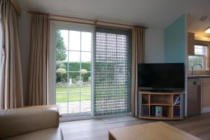 Телевизор и/или развлекательный центр в Kustverhuur, Groede Paarlhof 51