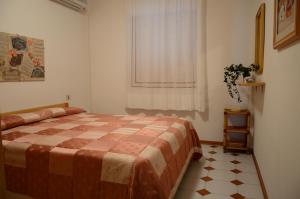 Postel nebo postele na pokoji v ubytování Brigitta Flat