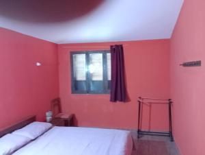 Postel nebo postele na pokoji v ubytování ApartamentoT1 Ponta do Sol