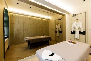 Телевизор и/или развлекательный центр в Radisson Blu Hotel, Doha