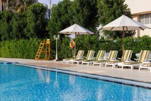 Бассейн в Radisson Blu Hotel, Doha или поблизости