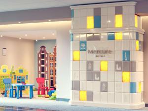 a lego store with a lego cube wall at Mercure Gdańsk Posejdon in Gdańsk