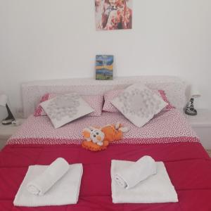 Posteľ alebo postele v izbe v ubytovaní B&B Appartamenti NAPOLI