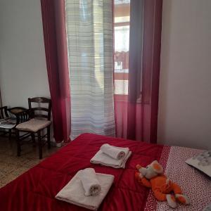 Posteľ alebo postele v izbe v ubytovaní B&B Appartamenti NAPOLI