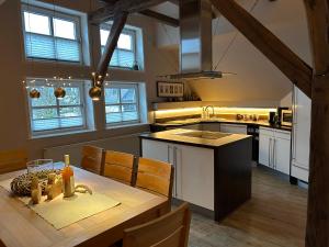 Dapur atau dapur kecil di Fachwerkliebe Ornes 3