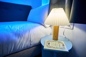 Postel nebo postele na pokoji v ubytování Hotel Gran Vía by gaiarooms