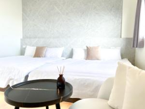 Een bed of bedden in een kamer bij 沙沙民宿