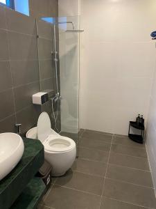 Koupelna v ubytování Floral Hue Garden & Riverside Villa