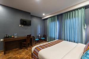 Lova arba lovos apgyvendinimo įstaigoje Hotel Yukhang