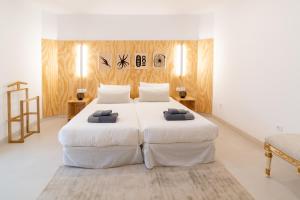 A bed or beds in a room at Primera Línea de Playa - MÁLAGA