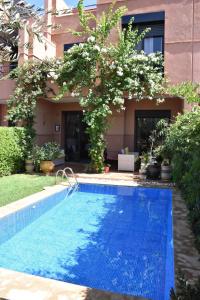 Πισίνα στο ή κοντά στο Villa avec piscine chauffée & privée, 3 chambres