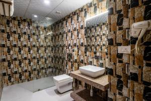 Koupelna v ubytování Hotel Yukhang