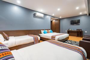 Lova arba lovos apgyvendinimo įstaigoje Hotel Yukhang