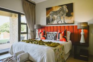 Ένα ή περισσότερα κρεβάτια σε δωμάτιο στο Tandweni Villa