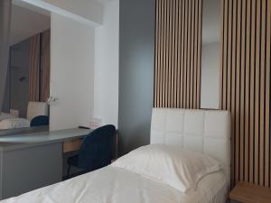 Letto o letti in una camera di Hotel Almanas