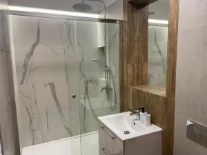 Koupelna v ubytování Aviendo Old Town Apartments