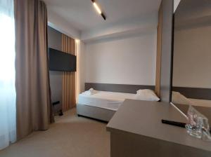 Letto o letti in una camera di Hotel Almanas