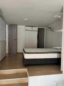 Postel nebo postele na pokoji v ubytování Habitación 101 en Casa Luz El Rodadero