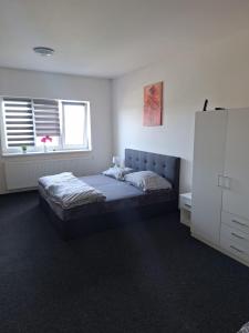 Postel nebo postele na pokoji v ubytování Apartmán U Radka