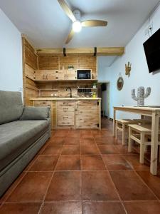 Kuchyň nebo kuchyňský kout v ubytování Apartamentos Alma de Zahara + 26 fotografií