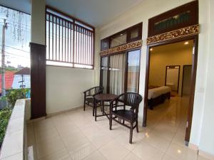 Postel nebo postele na pokoji v ubytování Brata Inn Ubud