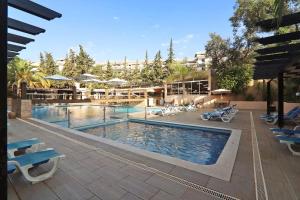 Πισίνα στο ή κοντά στο Sun and Serenity