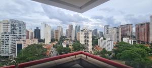 a view of a city skyline with tall buildings at Bienal Suites Ibirapuera c/ Sacada - UH 1207 in São Paulo