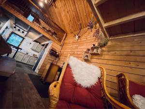 Posezení v ubytování Chalet de la Folie + 20 fotografií