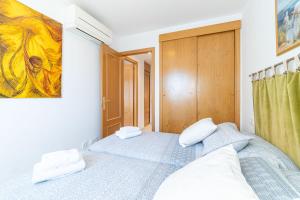 A bed or beds in a room at Apart-rent Apartment Port Salins 0163