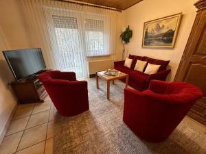Televisyen dan/atau pusat hiburan di Ferienwohnung Liva Wohnung C