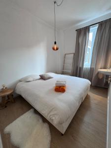 Ένα ή περισσότερα κρεβάτια σε δωμάτιο στο vakantiewoning Kloosterpad