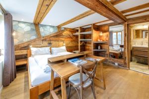 Postel nebo postele na pokoji v ubytování Hotel de la Croix-Fédérale + 6 fotografií