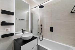 a bathroom with a sink and a shower at Greppon Blanc B4 - 6 pers - au pied des pistes in Nendaz +32 photos