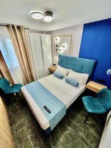 Postel nebo postele na pokoji v ubytování Elegante Apartamento TRES COLORES